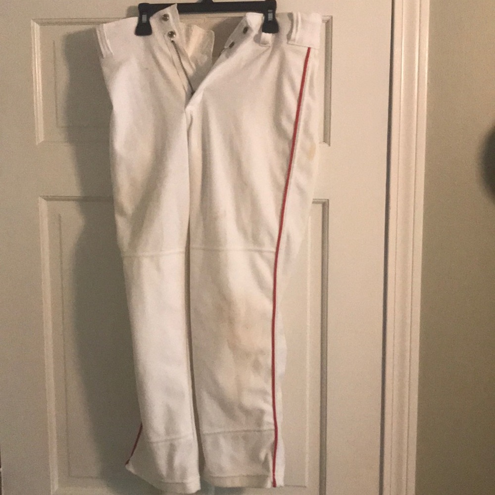 Baseball pants with red stripe